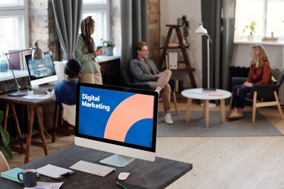 Team members collaborating in a modern marketing office
